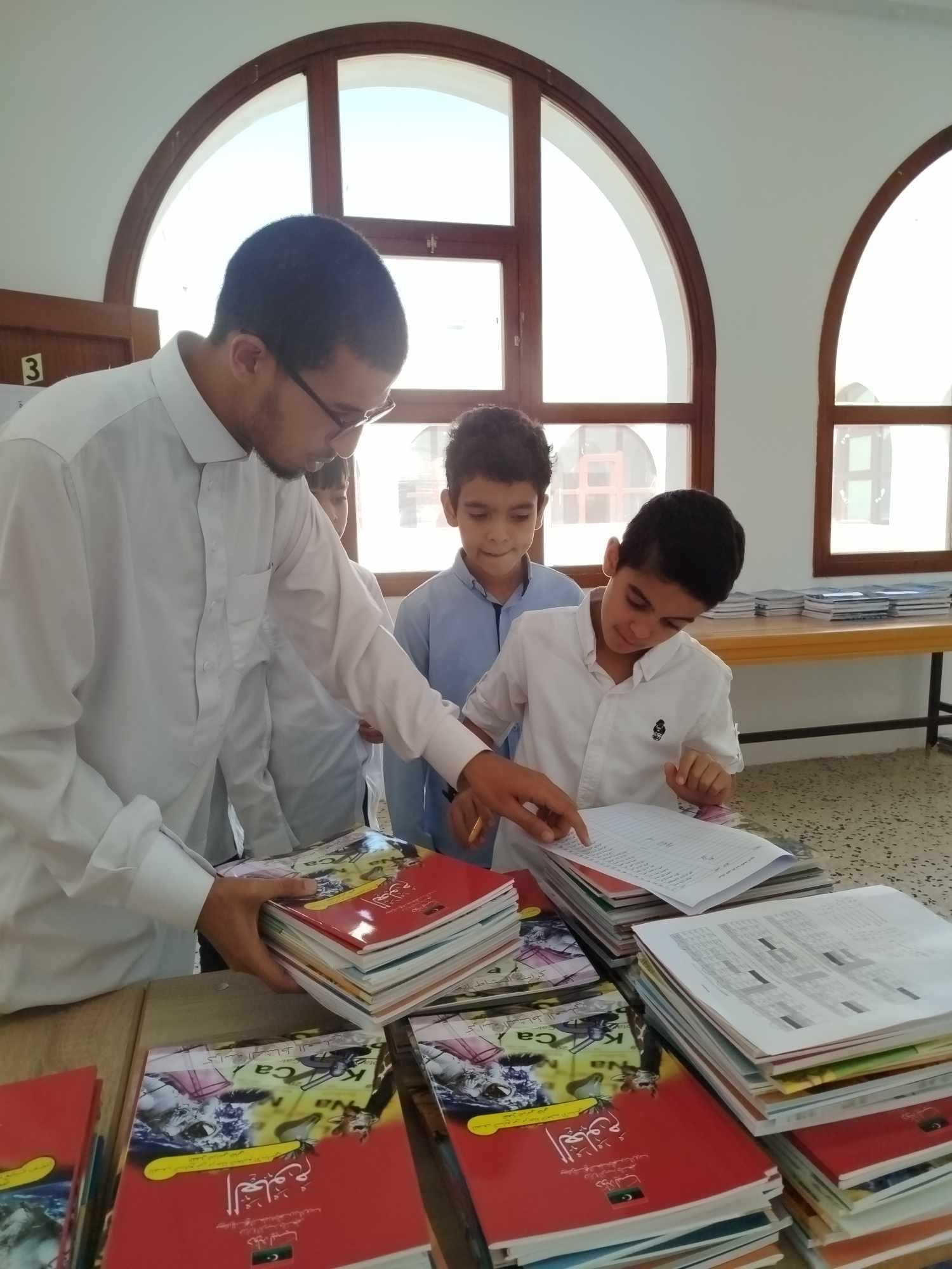 Students in a classroom with a teacher